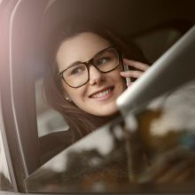 businesswoman-talking-on-phone-in-car-3783084